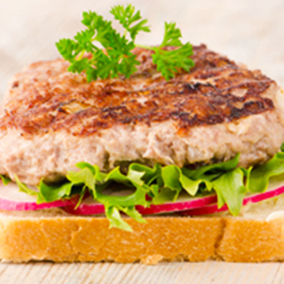 Creswick Farm's Ground Chicken Patty Displayed On A Sandwich