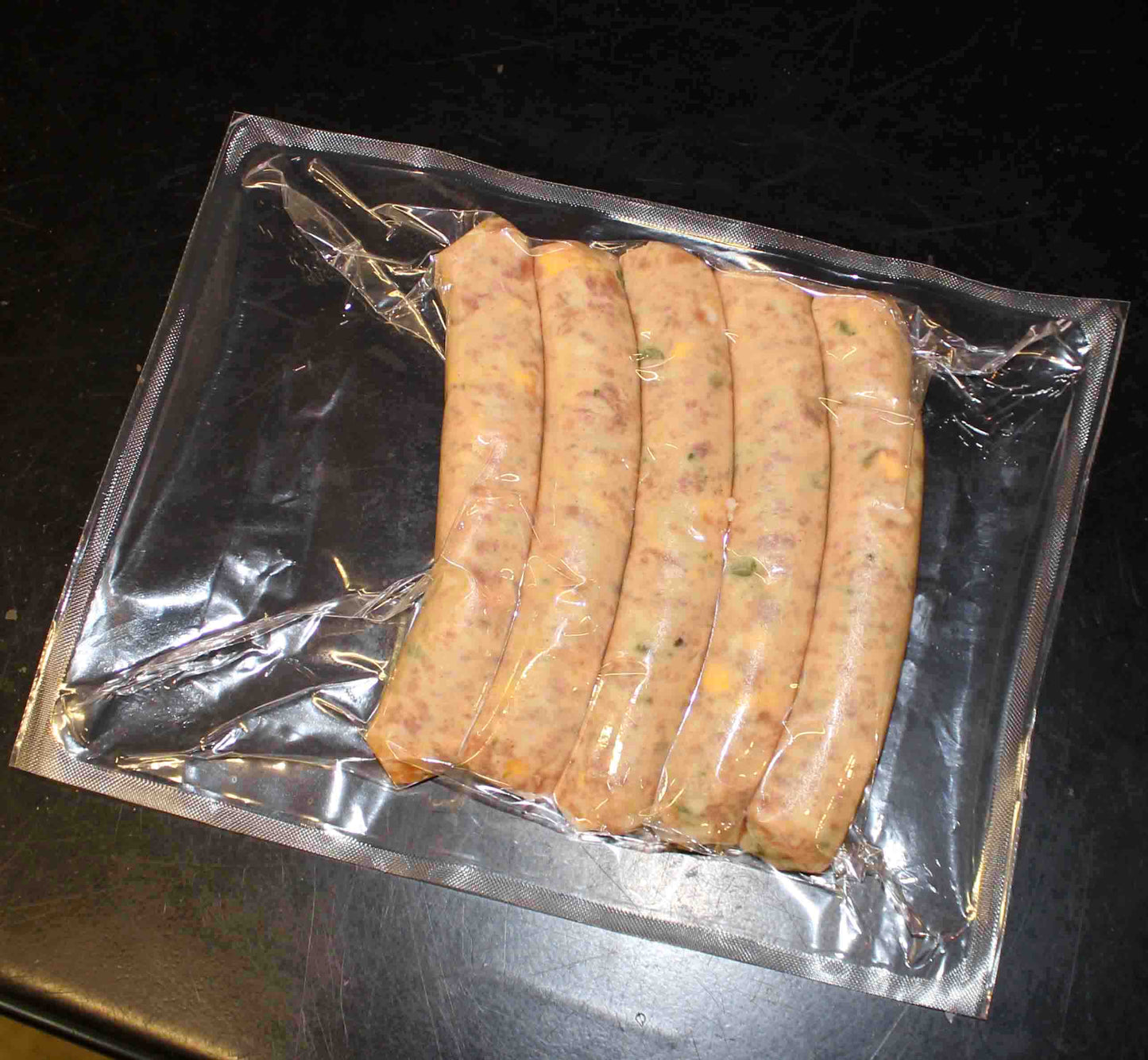 Creswick Farm's Asparagus Cheddar Brats Packaged . Keto friendly.